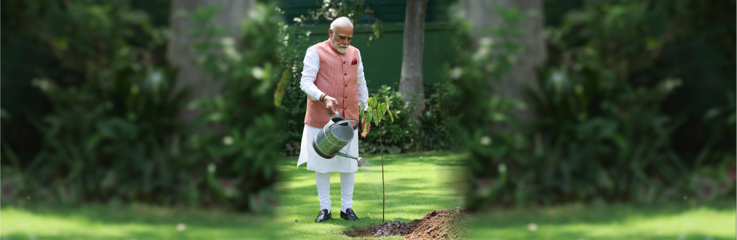 PM planting a sapling to mark the World Environment Day-2025 at his residence (7, Lok Kalyan Marg), in New Delhi