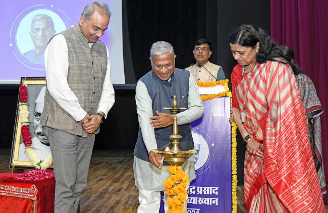 The Deputy Chairman of Rajya Sabha, Shri Harivansh lighting the lamp at the Dr Rajendra Prasad Memorial Lecture 2024 event at Akashvani Rang Bhavan, in New Delhi on November 29, 2024.