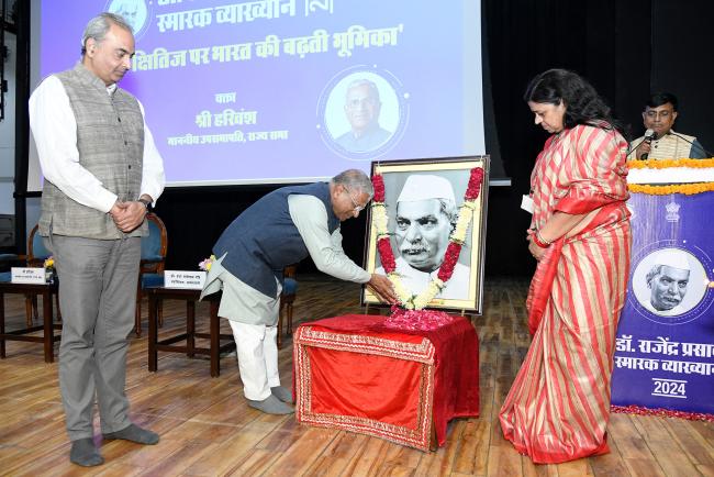 The Deputy Chairman of Rajya Sabha, Shri Harivansh pays floral tribute to the first President of India, Dr. Rajendra Prasad during the Dr Rajendra Prasad Memorial Lecture 2024 event at Akashvani Rang Bhavan, in New Delhi on November 29, 2024.