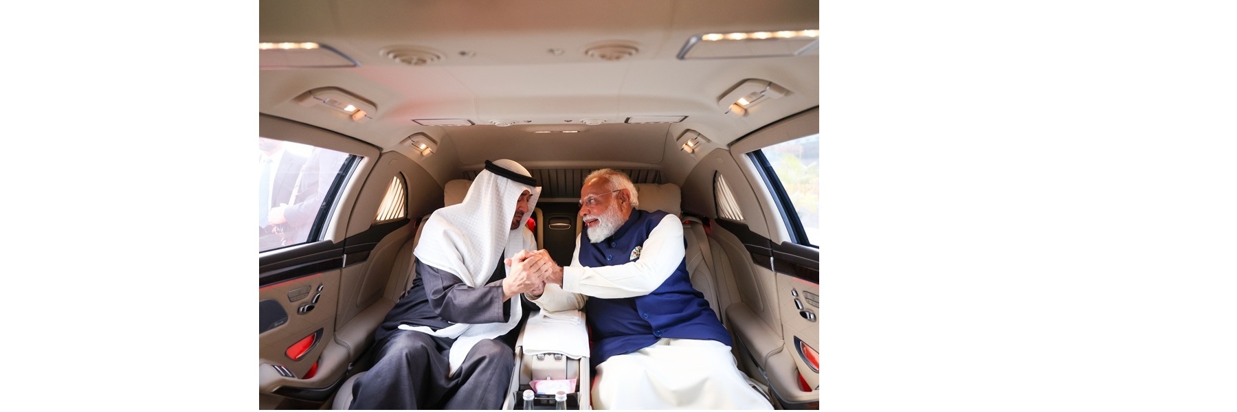 PM and Sheikh Mohamed bin Zayed Al Nahyan, President of the United Arab Emirates travel in the same car, as they depart from the Airport, in New Delhi