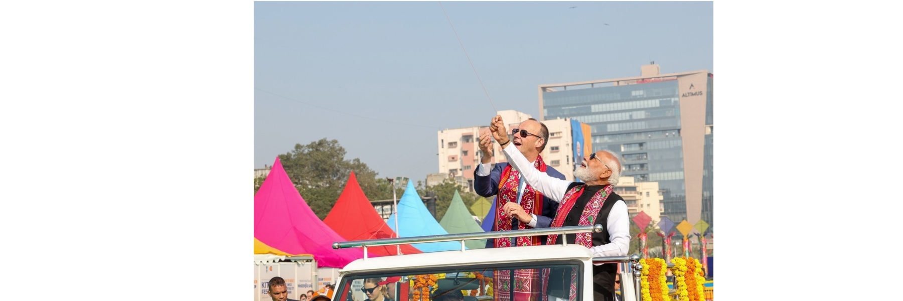  PM and the Chancellor of Germany, Mr. Friedrich Merz fly kites at the International Kite Festival at the Sabarmati Riverfront at Ahmedabad, in Gujarat