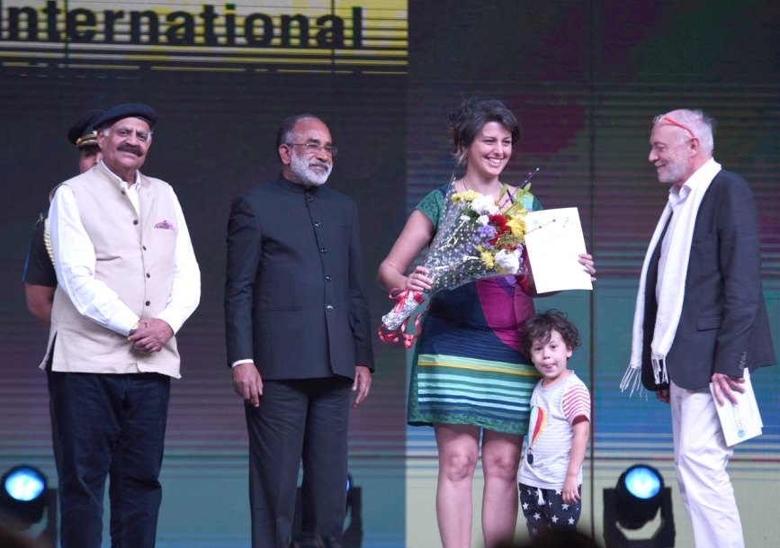 The Director of the movie ‘Los Silencious’, Ms. Beatriz Seigner being presented the Special Mention award, at the closing ceremony of the 49th International Film Festival of India (IFFI-2018), in Panaji, Goa on November 28, 2018. The Governor of Punjab & the Administrator of Chandigarh, Shri V.P. Singh Badnore and the Minister of State for Tourism (I/C), Shri Alphons Kannanthanam are also seen. 